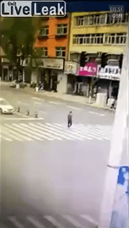 Man walking in the crosswalk is killed by a bus.gif